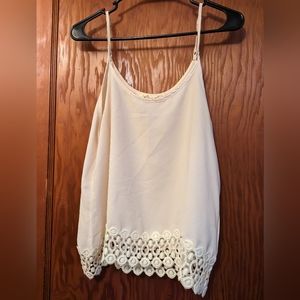 Semi sheer top with lacy details, size M
